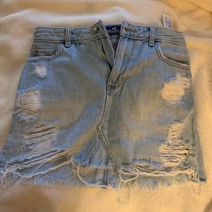 SIZE 3 Hollister mini jean skirt with holes.